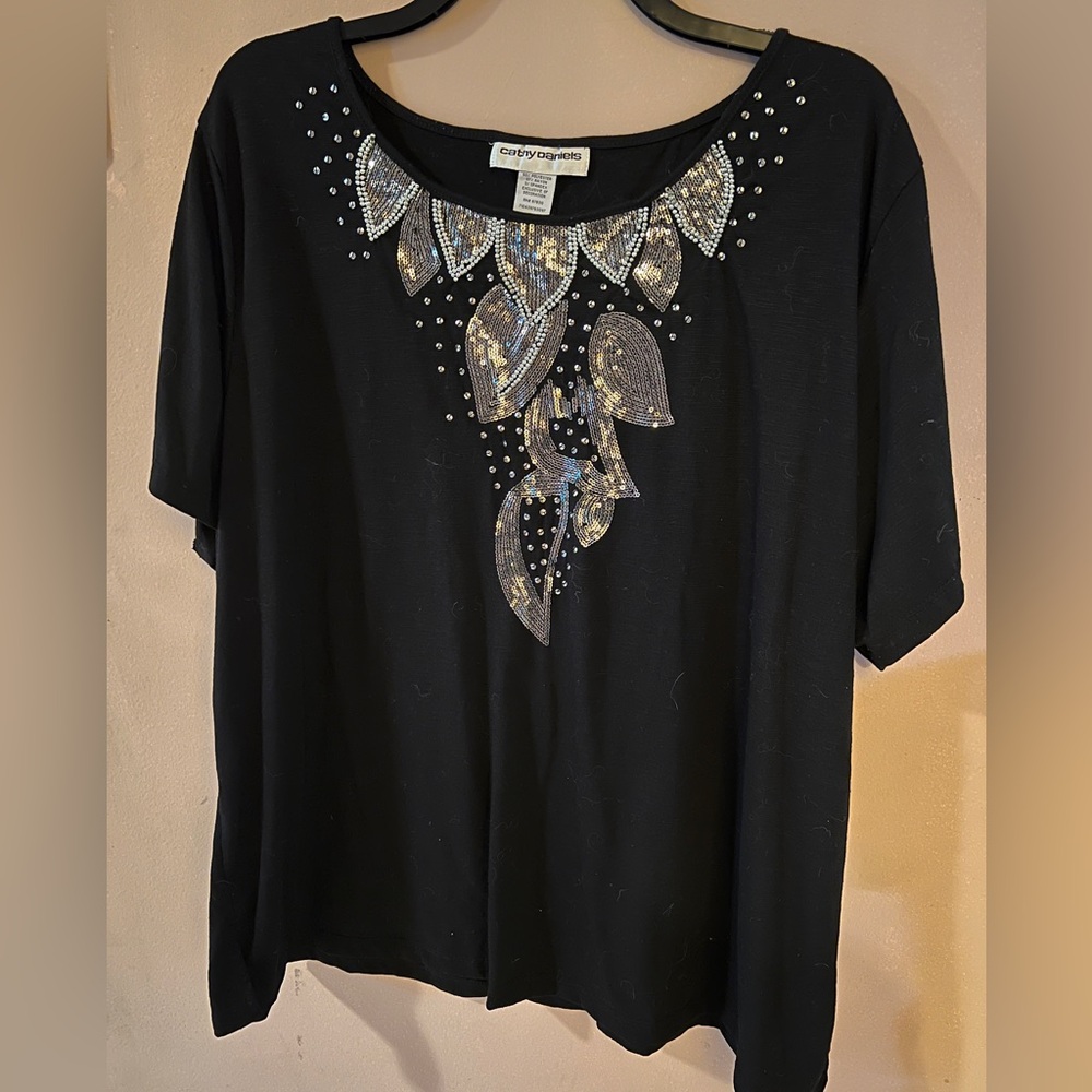Cathy Daniels women’s short sleeve black embellished top.